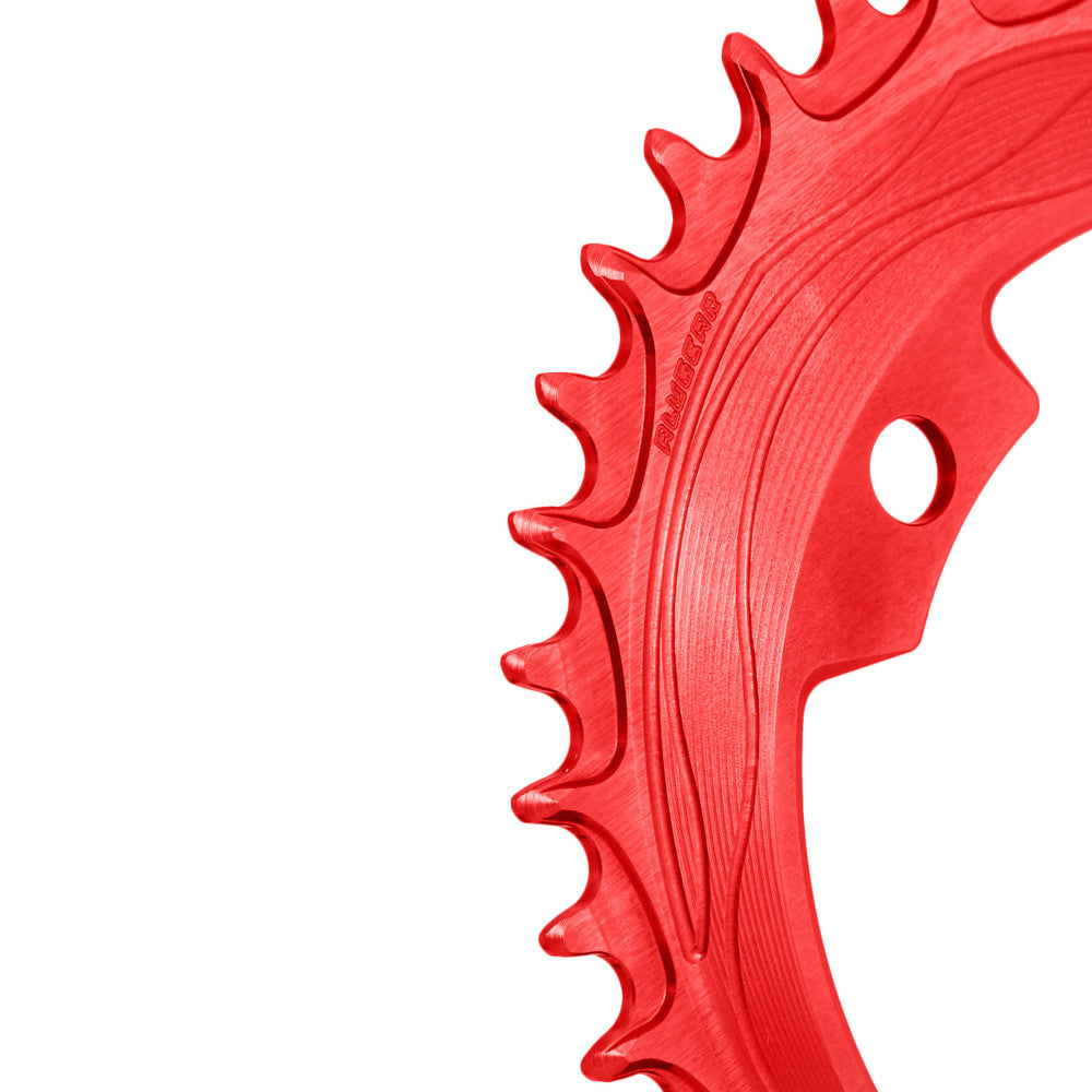 Red anodized ALUGEAR 94/96 BCD 4-bolt MTB chainring, macro close-up of narrow-wide teeth with flow-line machining