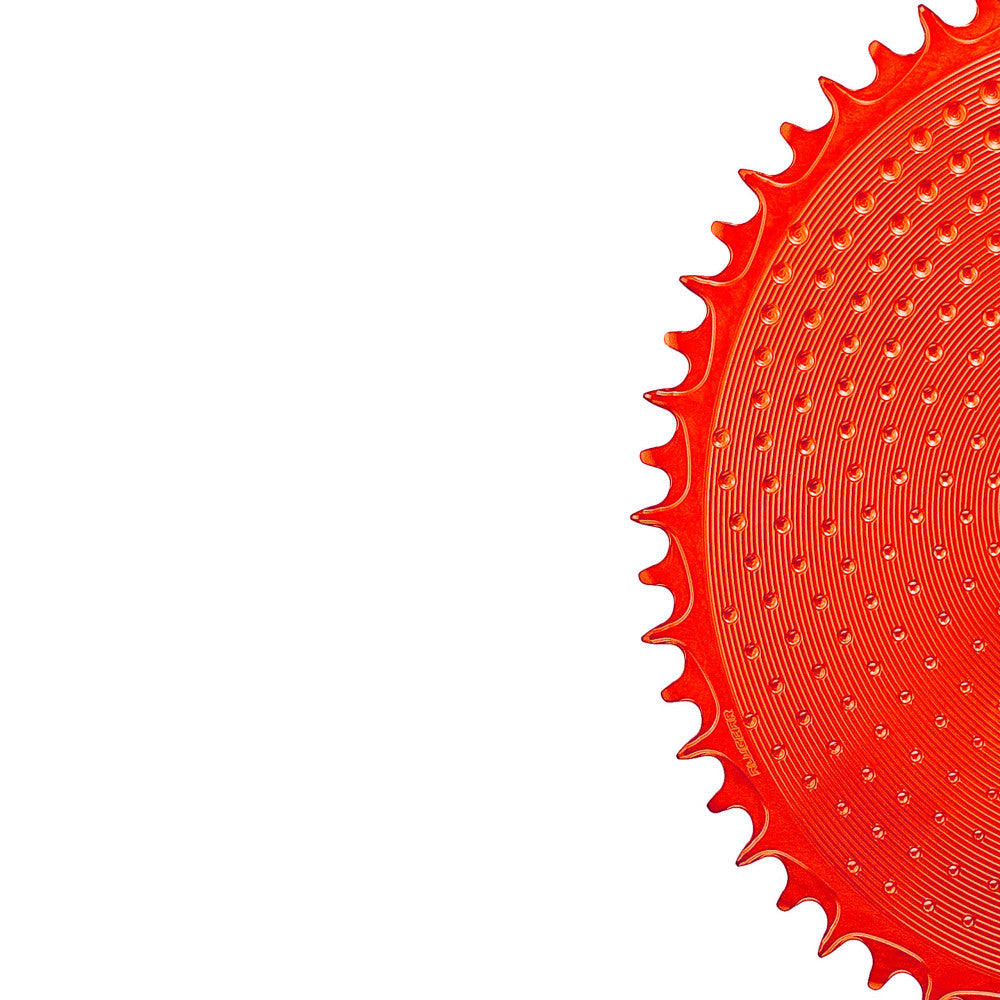 Close-up of red anodized ALUGEAR round outer road chainring edge with dotted surface, SRAM 8-bolt direct-mount