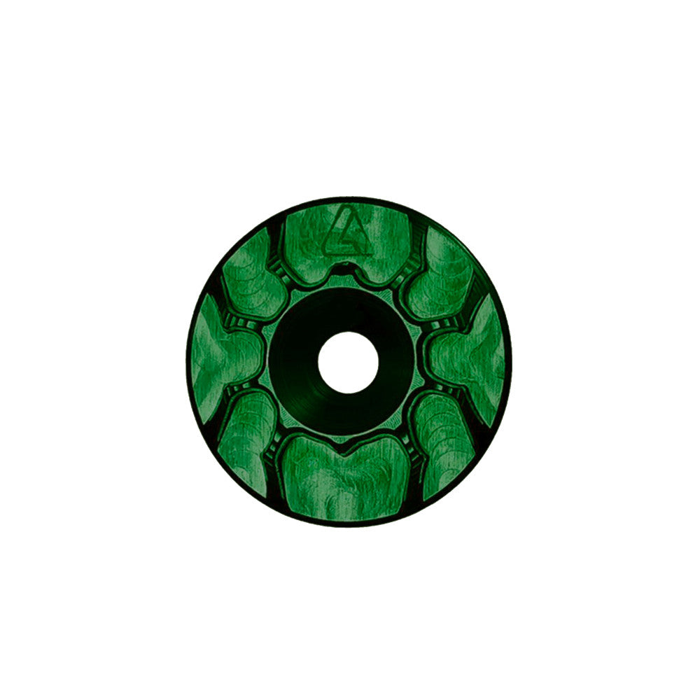 Green anodized ALUGEAR headset top cap with spider cut-out design, front face view