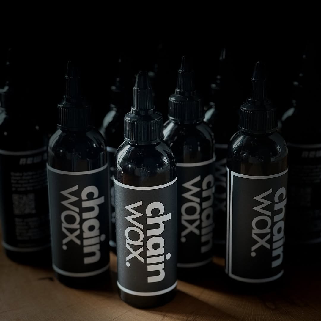 Multiple ALUGEAR Chain Wax Lube 150ml black dropper bottles displayed together