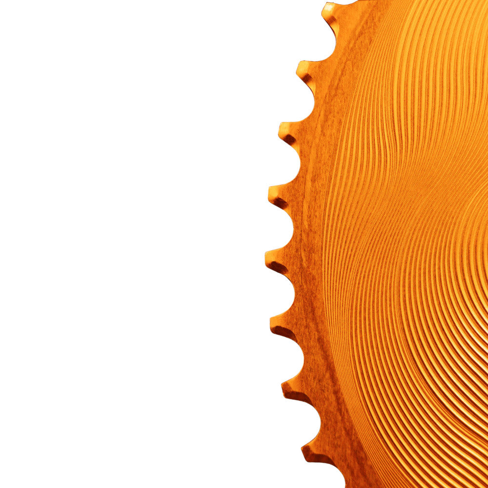 Orange anodized ALUGEAR AERO road chainring close-up, round, machined concentric wave finish, 110 BCD 4-bolt Shimano 12-speed