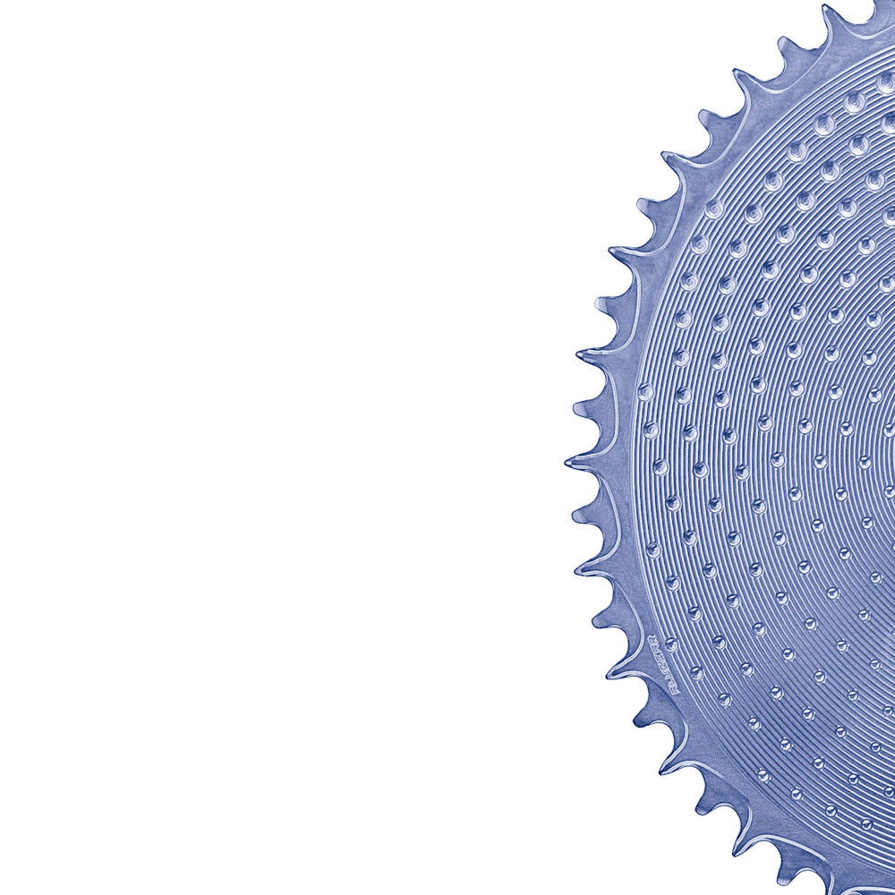 Blue anodized ALUGEAR round AERO road/gravel 1X chainring, thread mount 6.5mm offset, dot texture surface, partial view