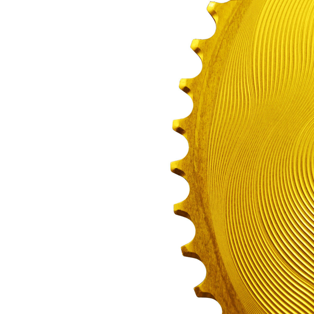 Gold anodized ALUGEAR AERO road chainring close-up, round, machined concentric wave finish, 110 BCD 4-bolt Shimano 12-speed