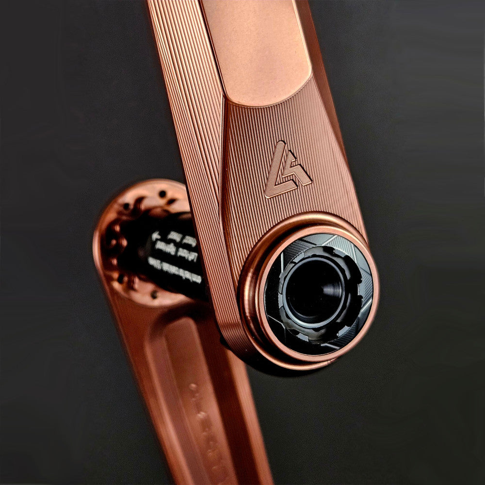 Rose copper anodized ALUGEAR Vega AL crank arm spindle boss detail, DUB interface and ALUGEAR logo, dark background