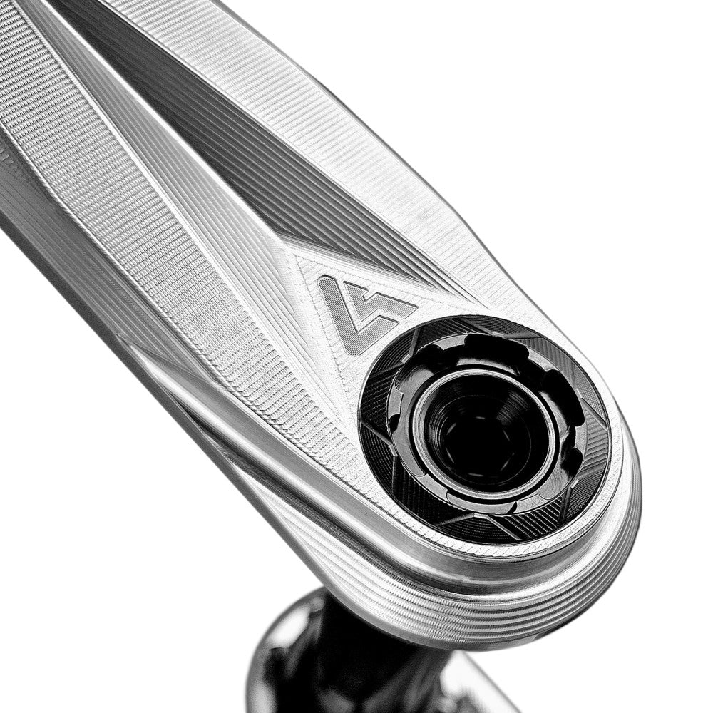 Close-up of silver ALUGEAR Stellar AL MTB crank arm at spindle junction, ALUGEAR logo and DUB interface detail
