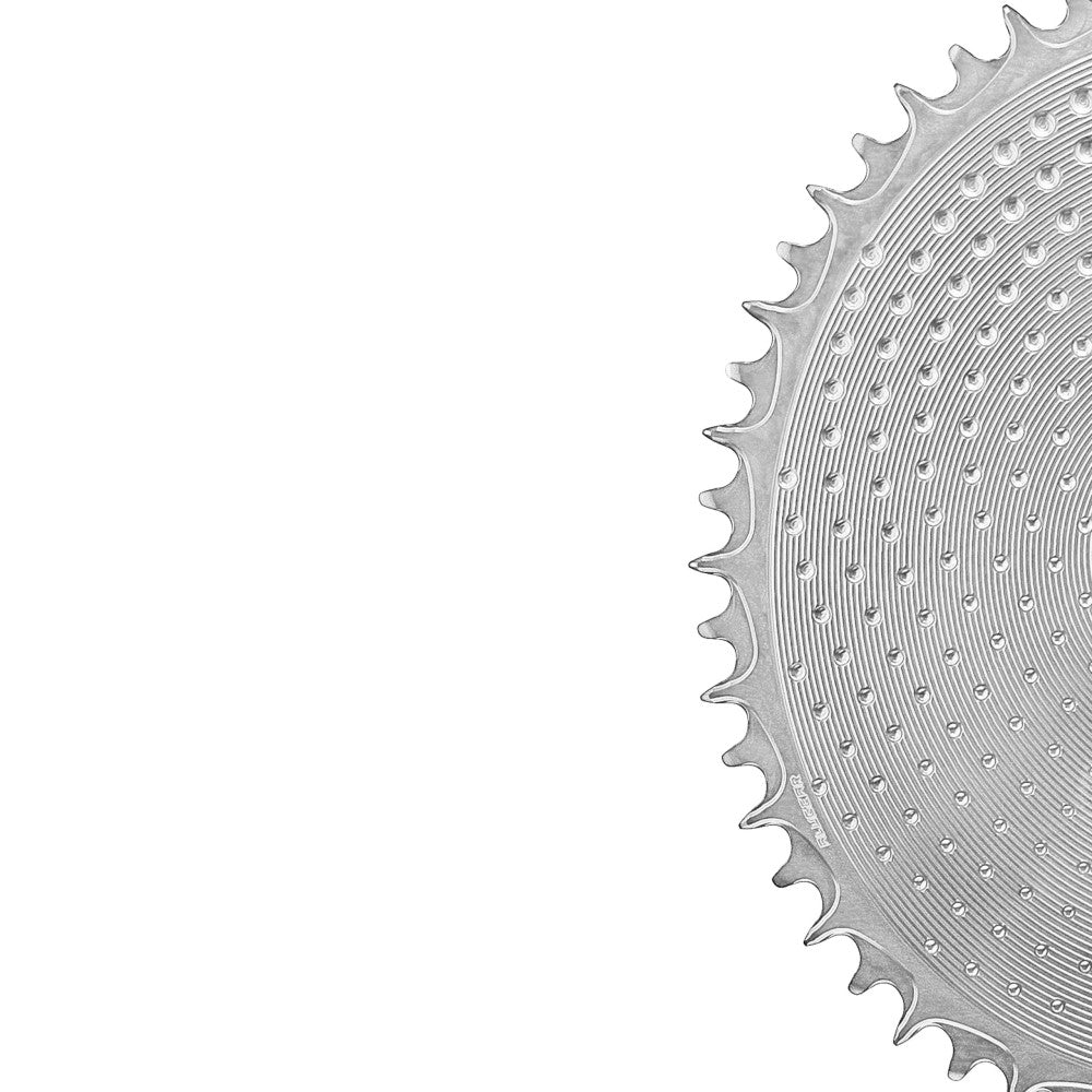 Close-up of silver natural ALUGEAR round outer road chainring edge with dotted surface, SRAM 8-bolt direct-mount