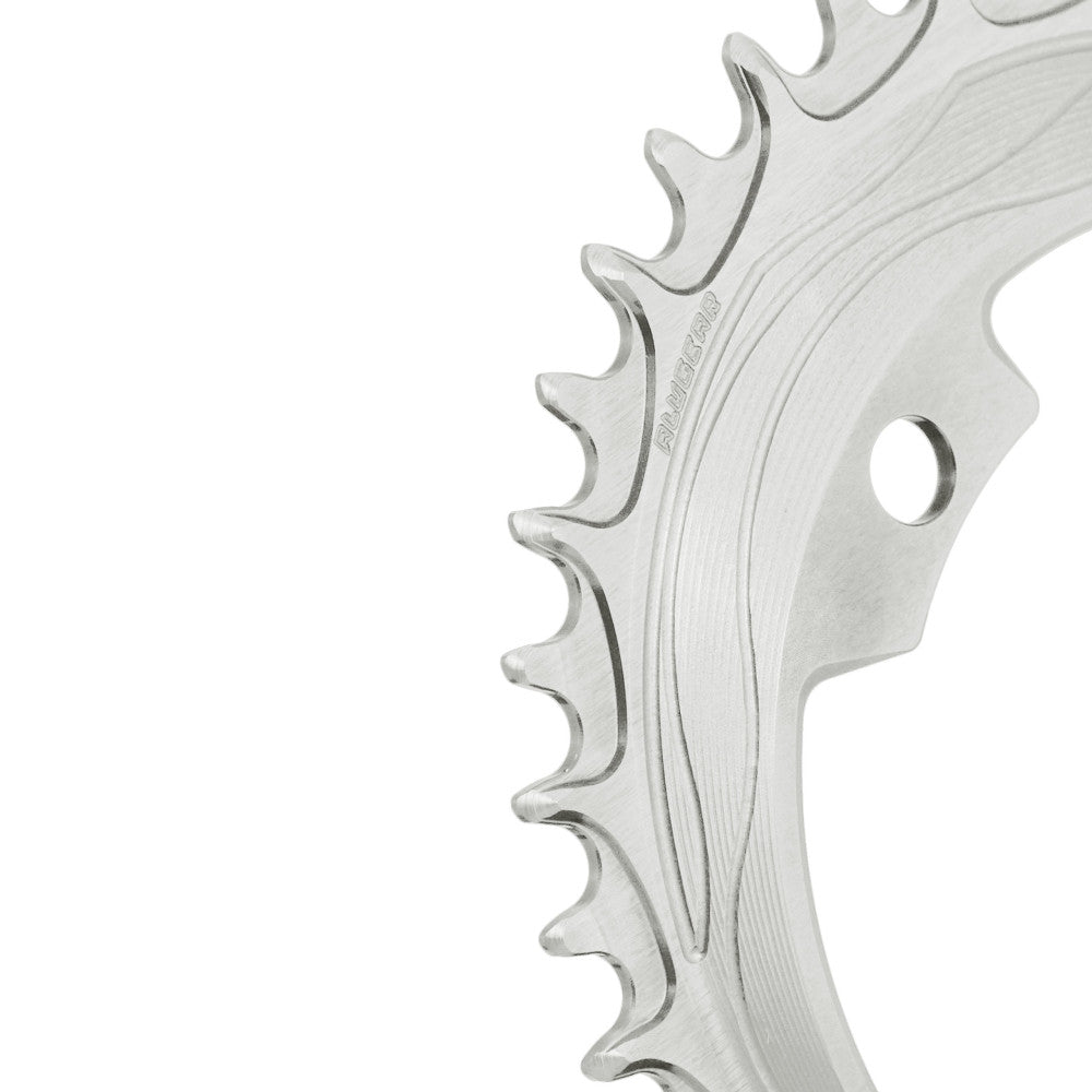 Silver natural-finish ALUGEAR 94/96 BCD 4-bolt MTB chainring, macro close-up of narrow-wide teeth with flow-line machining