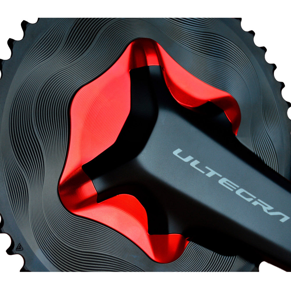 Red anodized ALUGEAR aero cover installed on Shimano Ultegra R8100 crank with black AERO chainring, wave texture detail