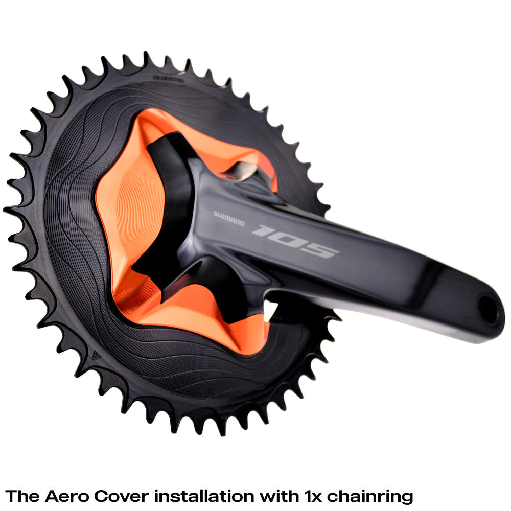 Orange ALUGEAR aero cover installed on Shimano 105 R7100 crank with black round chainring, 1x setup