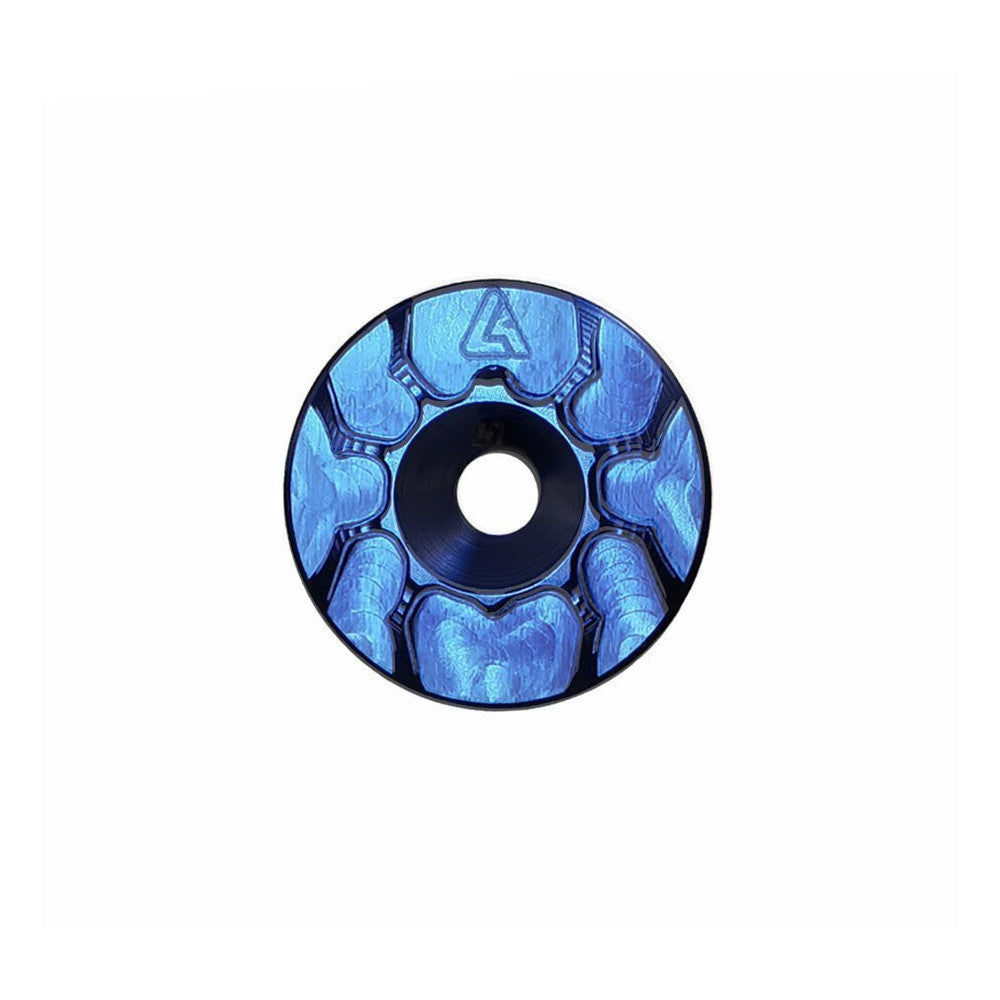 Blue anodized ALUGEAR headset top cap with spider cut-out design, front face view
