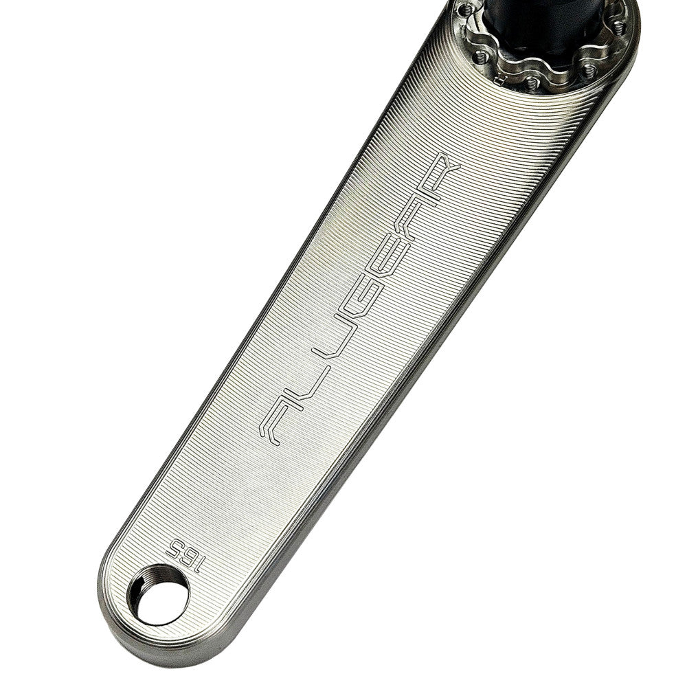 Close-up of titanium ALUGEAR Stellar Ti crank arm showing 165mm engraving and DUB spline interface