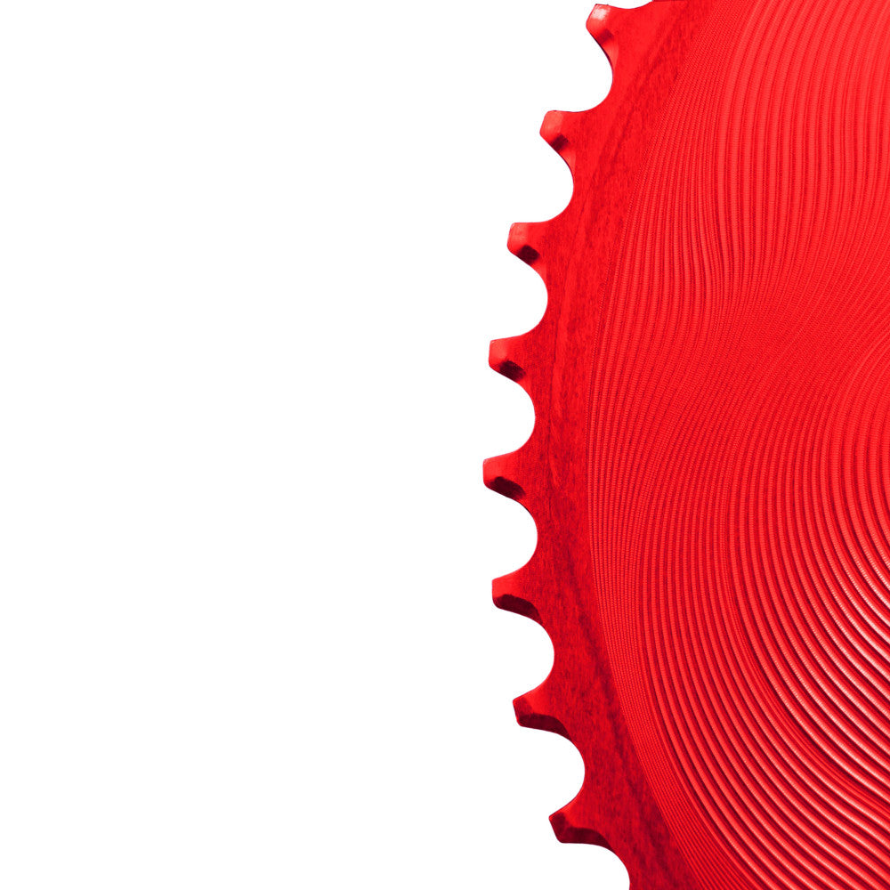 Close-up of red anodized ALUGEAR AERO road chainring surface with wave machined finish, 110 BCD 4-bolt Shimano asymmetric