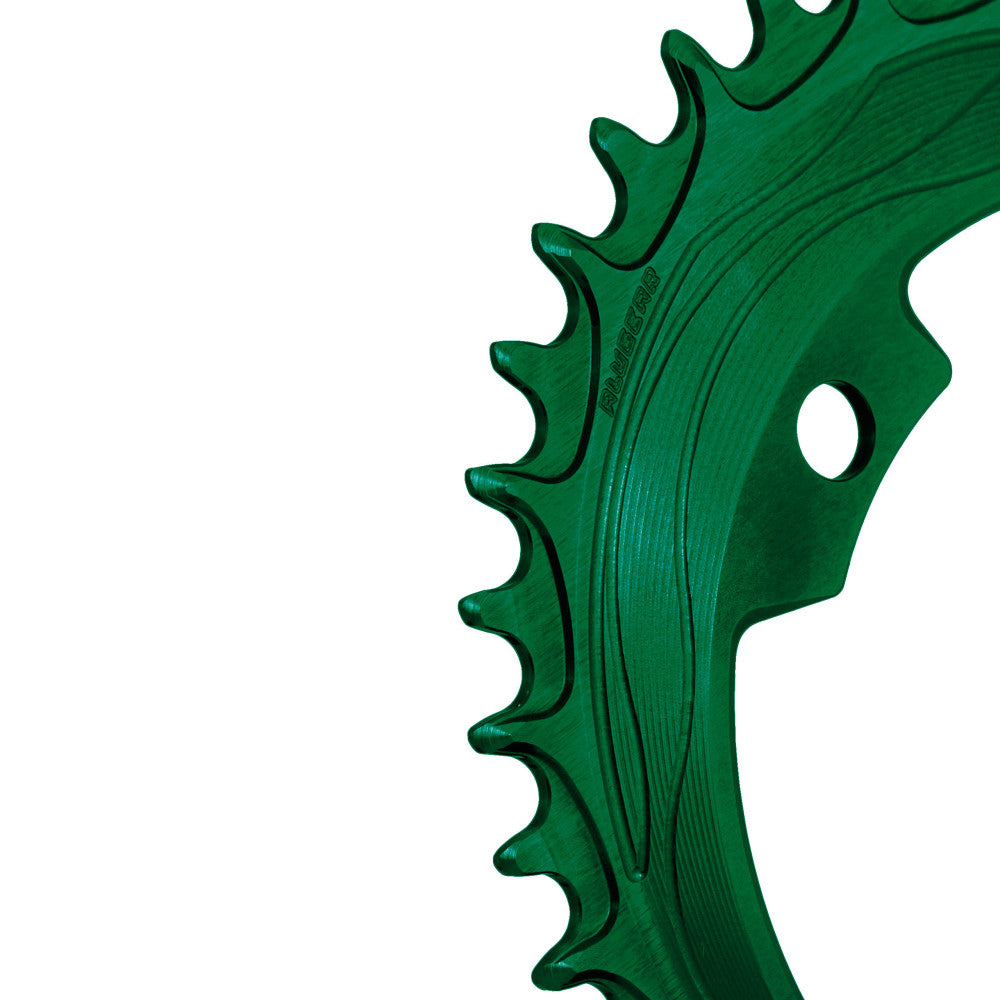 Green anodized ALUGEAR 94/96 BCD 4-bolt MTB chainring, macro close-up of narrow-wide teeth with flow-line machining